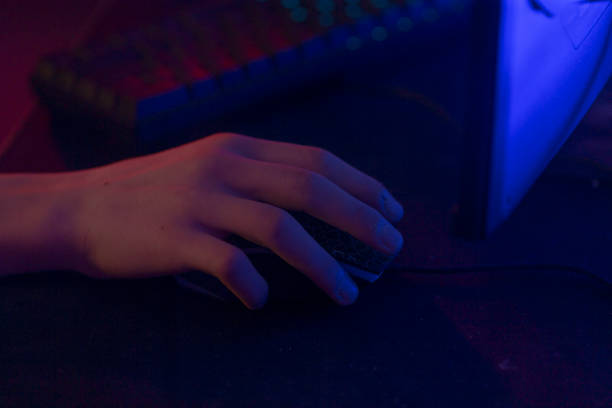istock A close up view of a person s hand skillfully using a computer mouse 2190377997