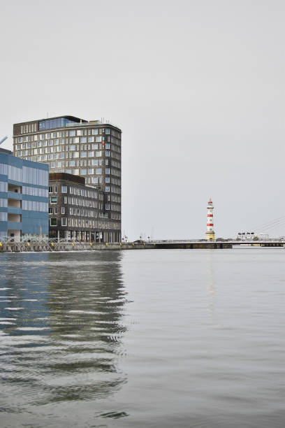 Urban landscape with a lighthouse. Modern Swedish architecture.