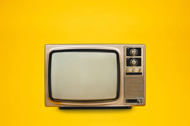 istock Vintage, retro old TV (television) with blank screen isolated on yellow background, front view, clipping path 2190379697