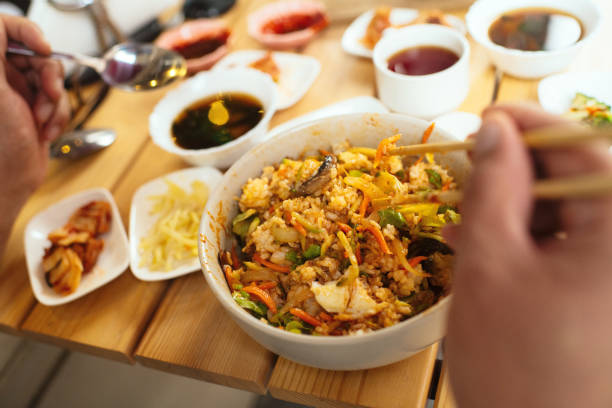 Man mixing his Bi Bim Bap