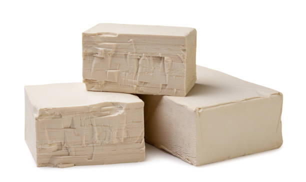 istock Pile of yeast close-up on a white background. Isolated 2190382002