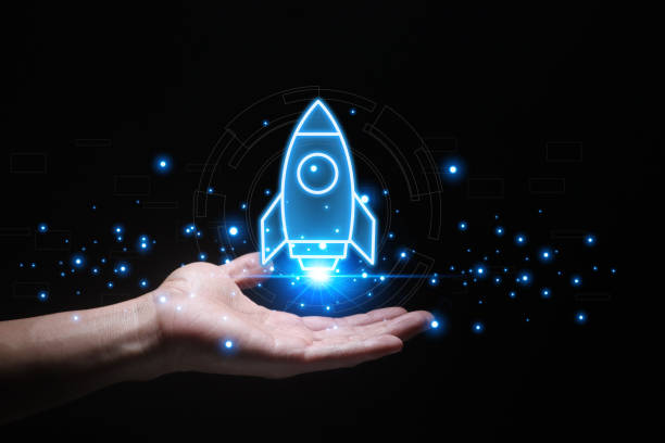 istock Startup business start-up with technology background as a rocket image conveying the idea of ​​launching a well-planned new business. 2190382197