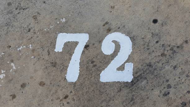 istock The concrete road surface has numbers. Number 72 2190382401
