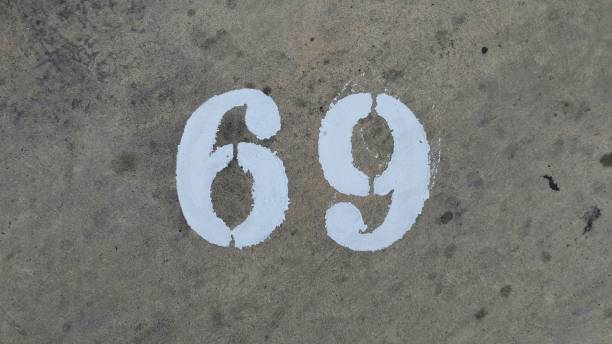 istock The concrete road surface has numbers. Number 69 2190382402