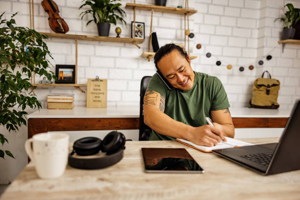 istock Small business owner talking with customers 2190382577