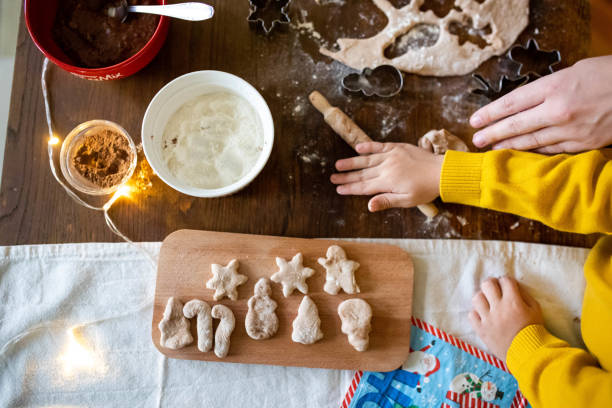 istock Children's Christmas fun while making festive cookies 2190382620
