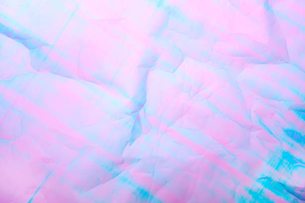 istock An abstract background featuring pastel hues of pink and blue 2190389369