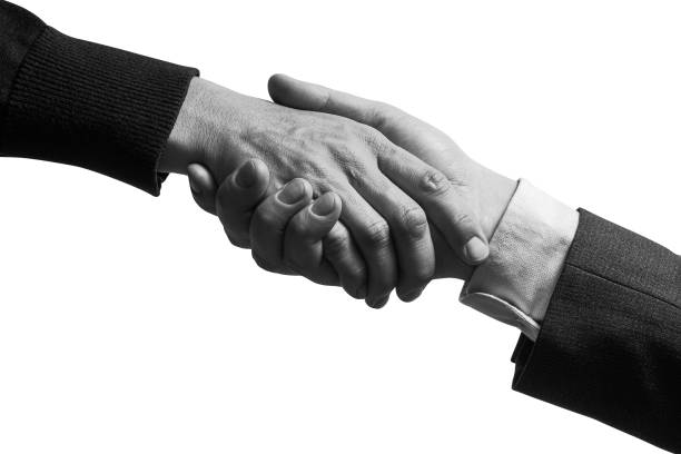 istock Closing a deal with a handshake. 2190389397