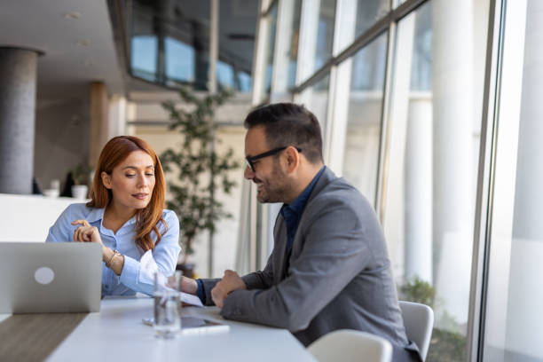 istock Smiling multiracial team discussing ideas in the office 2190392272