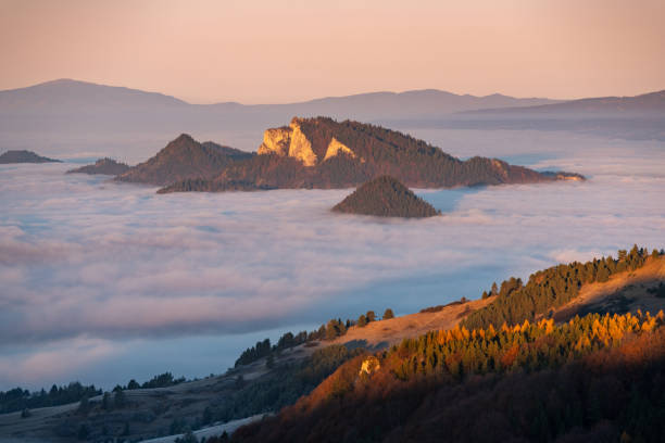 istock Mountain Peaks Above Fog at Sunrise 2190395189