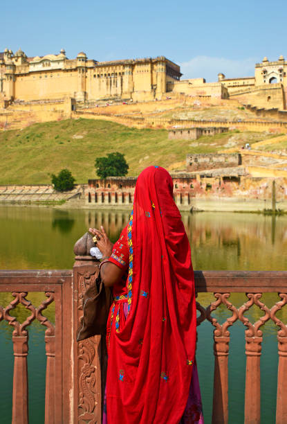 Indian woman viewing Amber Fort from outside