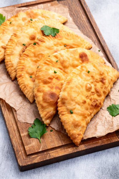 istock Snack chebureks. Pasties with meat photography . Top view 2190396793
