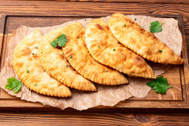 istock Snack chebureks. Pasties with meat photography . Top view 2190396799