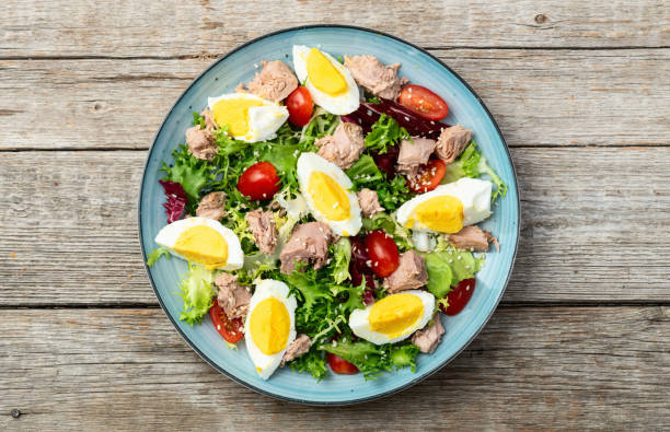 istock Canned Tuna salad with eggs and tomatoes photography . Top view 2190398155