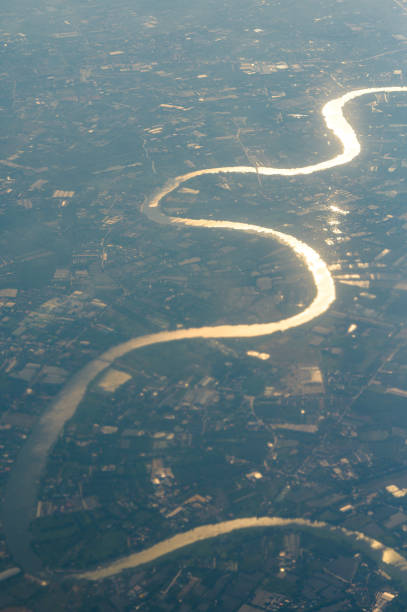 Nature sunset chaopraya river and bangkok view shot from airplane