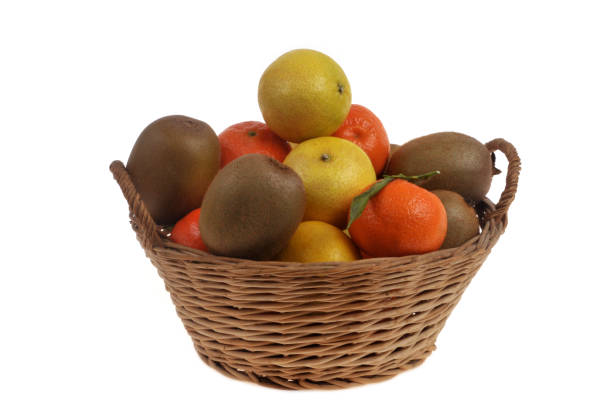 istock Fruits in a wicker basket isolated on white 2190400218