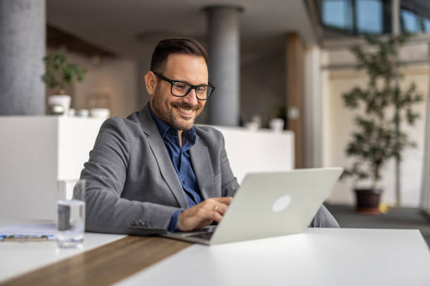 istock Modern businessman at vork, laptop and strategic thinking 2190400993