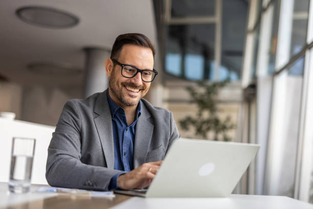 istock Modern businessman at vork, laptop and strategic thinking 2190401046