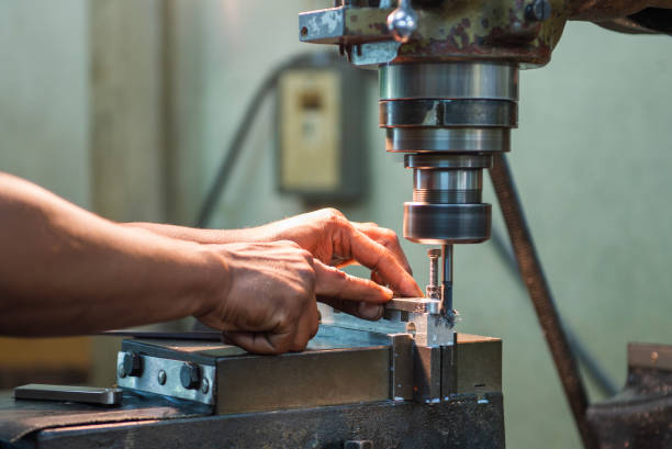 istock The metal working operation on NC milling machine. 2190402756