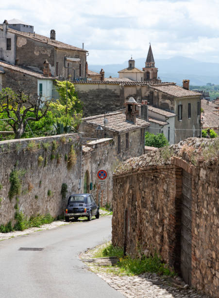 Narrow street with vintage car. Amelia is an ancient town in the Province of Terni.