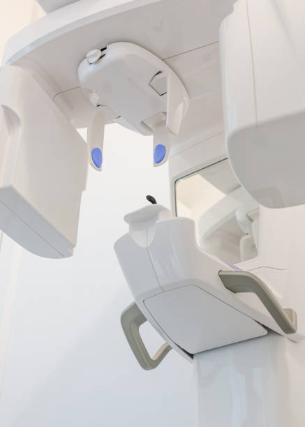 istock Vertical shot of a panoramic dental X-ray machine (orthopantomograph), designed for capturing comprehensive images of the teeth and jaw in dentistry 2190404525