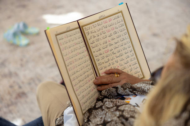 A woman reading the Quran