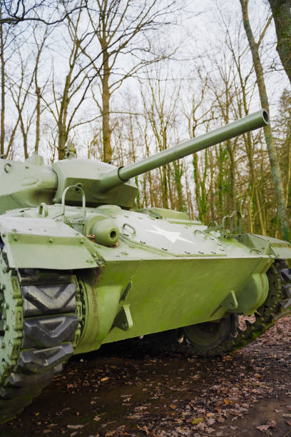 istock Military Tank in Forest Landscape on Autumn Day Representing War History 2190405940