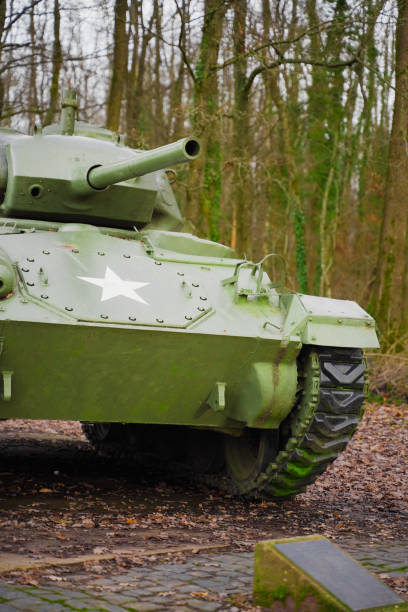 istock Military Tank Displayed in a Forest Environment During Wintertime 2190405943
