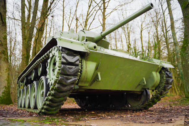 istock Green Military Tank on Display in a Forest, Capturing History and Technology 2190405952