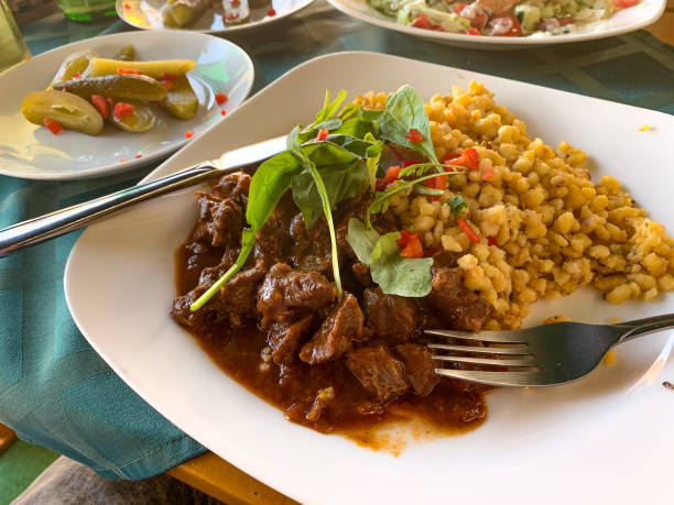 istock Small potato dumplings with beef goulash. 2190409579