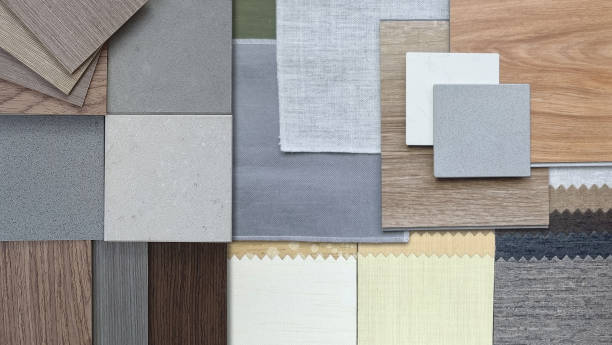 istock collection of interior design material samples, including various wood veneers, fabric swatches, stone or concrete tiles, wooden vinyl floor tiles. 2190410445