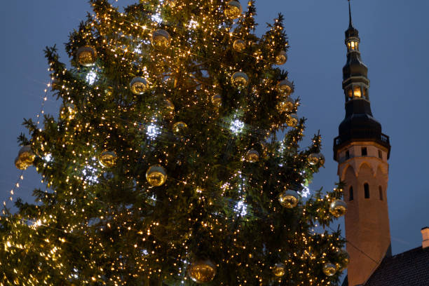 istock A Beautifully Illuminated Christmas Tree in the Historic Town Square During Dusk 2190411329