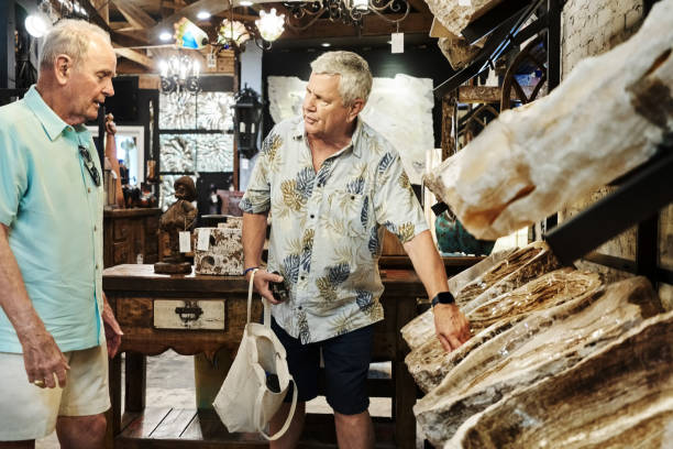 istock Senior men shopping for a unique stone piece at home decor store 2190413863