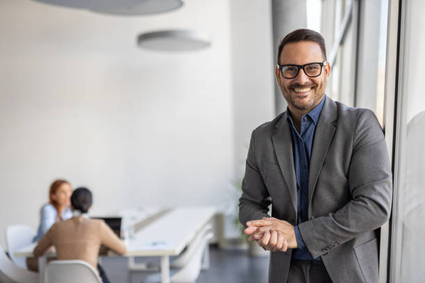 istock Professional portrait, mid-adulthood businessman in office 2190414405