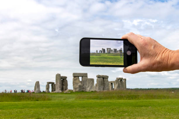 istock obile phone taking picture of Stonehenge prehistoric structure 2190415575