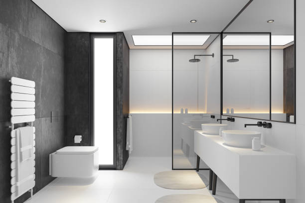 istock Modern Minimalist Black and White Master Bathroom Interior with Double Sinks and Shower with large black marble tiles 2190417479