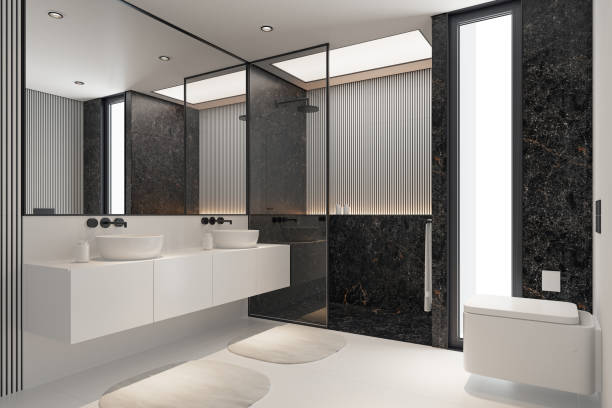 istock Modern Minimalist Black and White Master Bathroom Interior with Double Sinks and Shower with large black marble tiles 2190418030