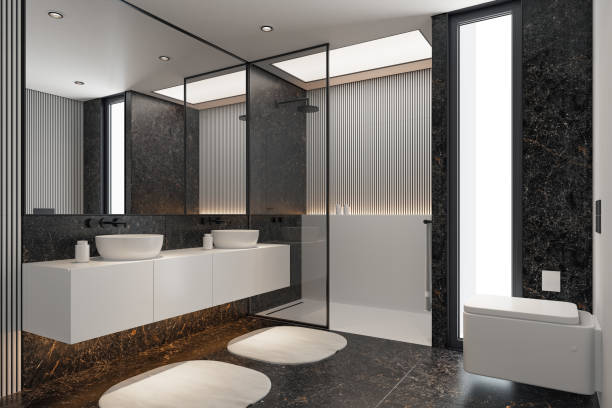 istock Modern Minimalist Black and White Master Bathroom Interior with Double Sinks and Shower with large black marble tiles 2190418031