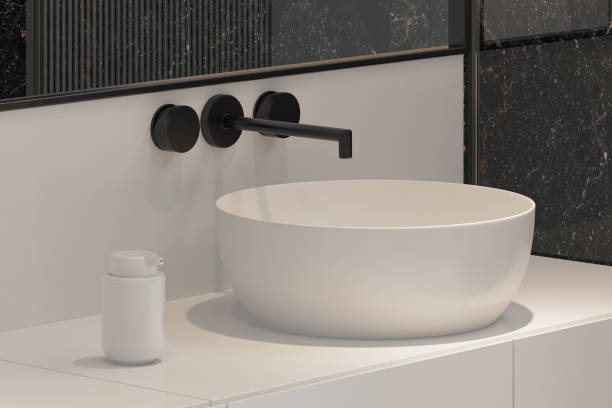 istock Modern Minimalist Black and White Master Bathroom Interior with Double Sinks and Shower with large black marble tiles 2190418213