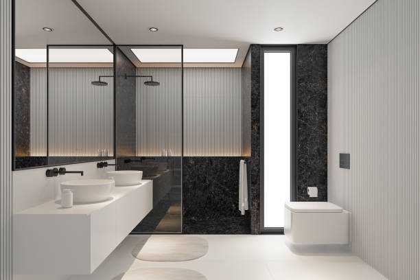 istock Modern Minimalist Black and White Master Bathroom Interior with Double Sinks and Shower with large black marble tiles 2190418488