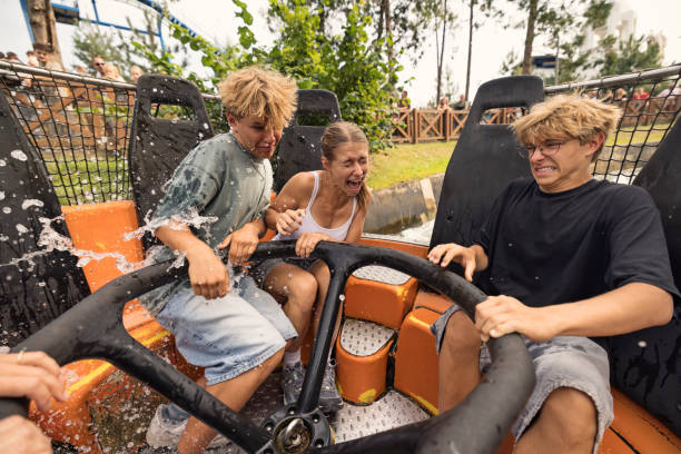 istock Teenagers enjoying fast, scary river rapids ride in amusement park 2190424089