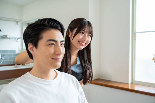 istock A man discussing his hairstyle 2190424943