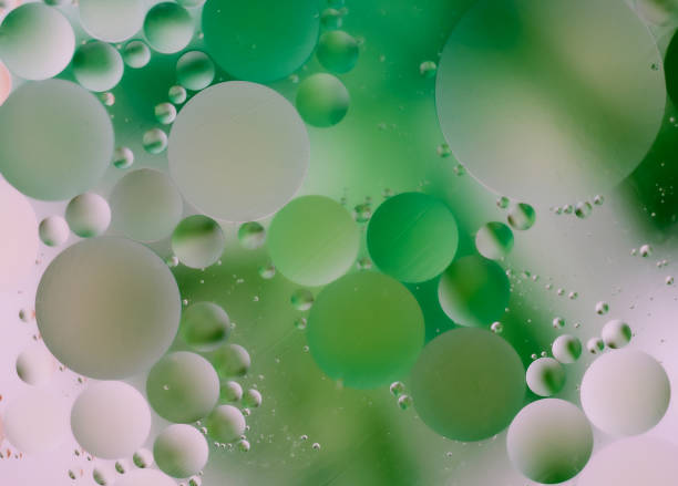 istock Green Abstract Background with Floating Oil Bubbles 2190430629