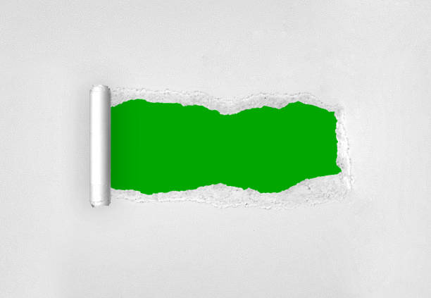 istock frame of torn white paper on green background 2190431191