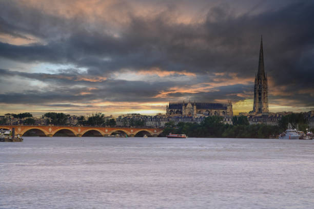 istock Pont de Pierre bridge and St. Michael church, Bordeaux 2190432199