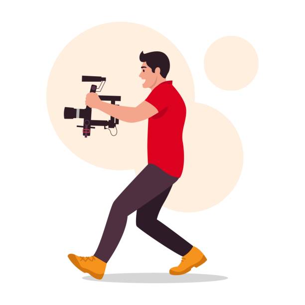 istock Vector illustration of a talented videographer.Cartoon scene of a guy holding a video camera and taking a quick shot isolated on a white background.Shooting at weddings,festive events,concerts, shows. 2190434813