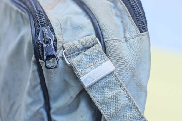 istock black closed metal zip on gray dirty fabric bag 2190437801