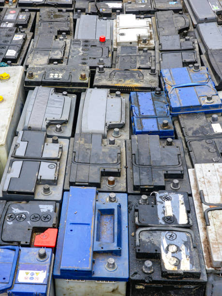 istock Stack of many used car batteries for recycling in a hazardous waste facility 2190441292