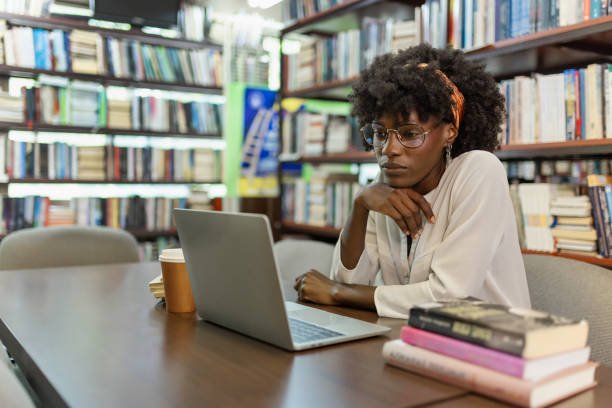 istock Young Black Female Professional Working in a Quiet Library 2190441442