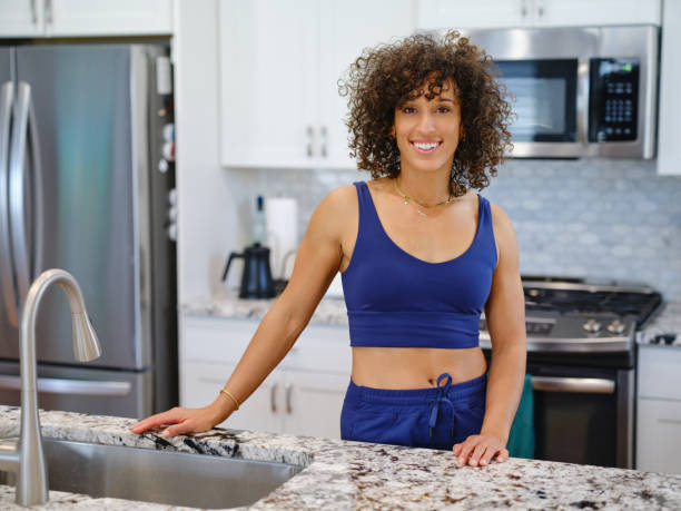 istock Woman in a Home Kitchen 2190447838